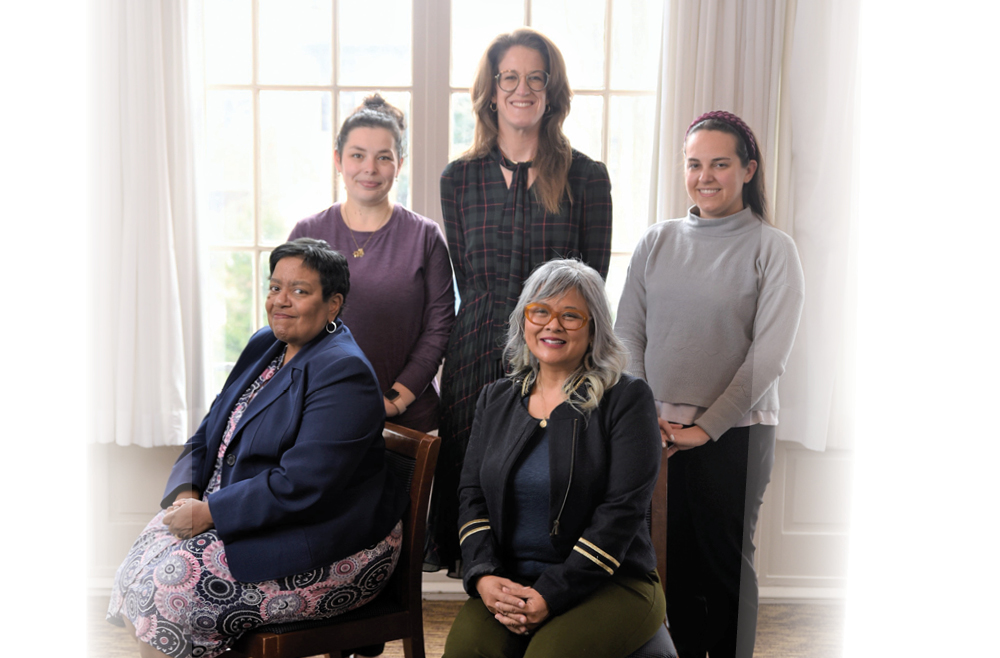 A group photo of the Diversity, Equity, and Inclusion Committee Workgroup Chairs with Deborah Drayton and Maria Beatty sitting on chairs in the front, and Svetlana Goldshteyn, Joan Miller, and Alison Schlegel standing behind them 